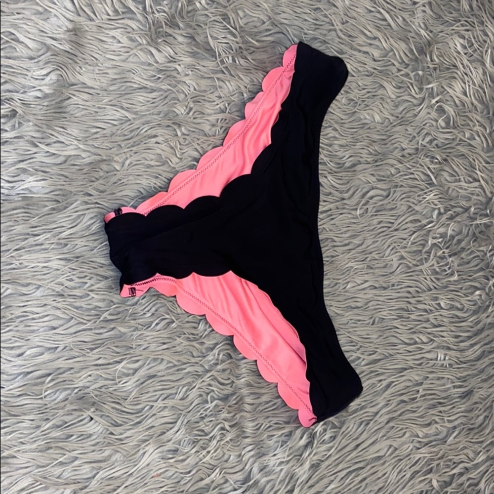 Pink Victoria’s Secret bathing suit bottoms